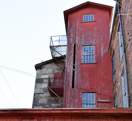 Look closely and you will see a red door next to the fire escape.